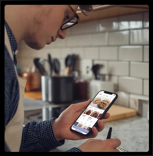Participant reviewing app screens during research