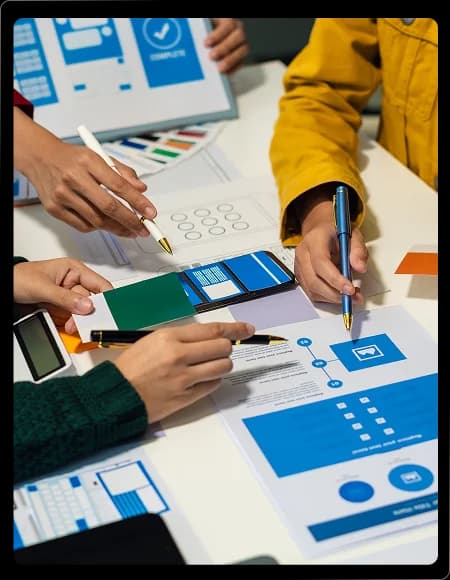 Facilitator preparing scripts for moderated usability tests